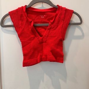 Out from under short sleeve crop